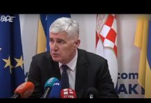 Čović licemjeran: Poziva se na EU, protiv sankcija Rusiji, pa zastava Ukrajine iza njegovih leđa!